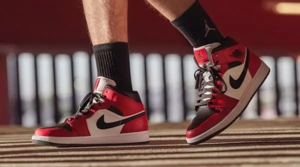 On-feet Nike Air Jordan 1 Mid Chicago Black Toe