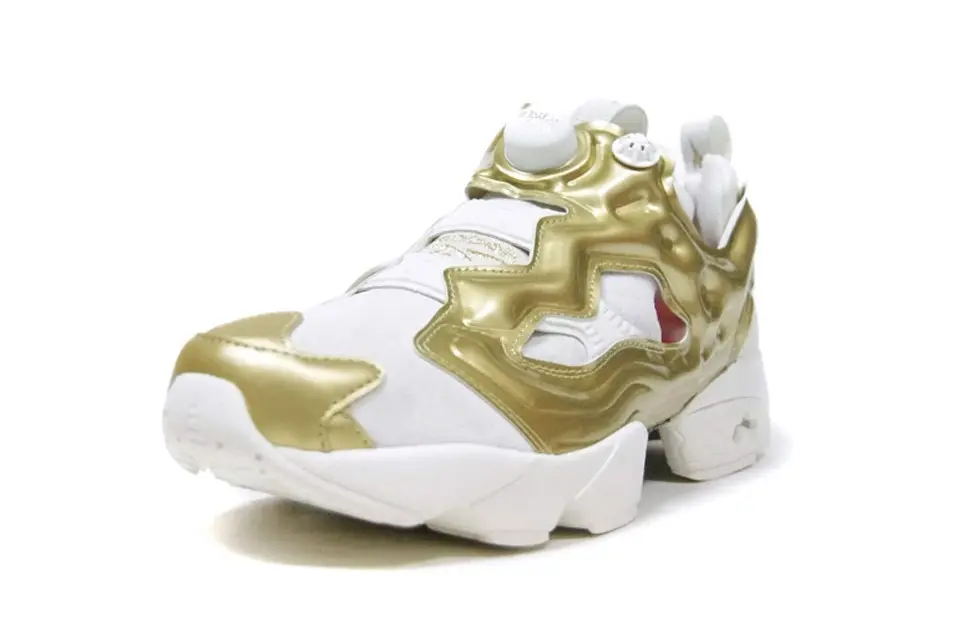 Reebok kết thúc Instapump Fury OG của mình trong "Chalk/Gold Metallic/China Red" cho Tết Nguyên Đán