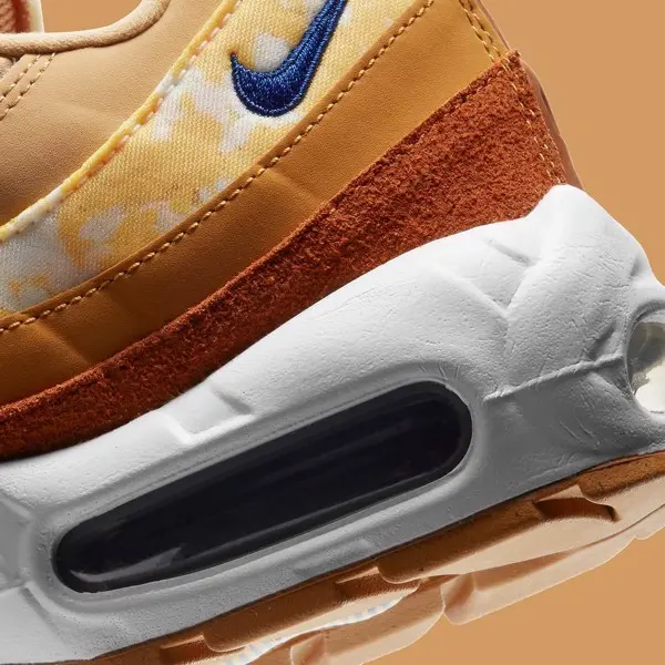 Hinh anh 1: Nike Air Max 95 SE "Tawny" bung chay voi giai dieu cua mua thu