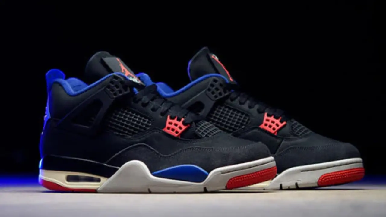 Hinh anh 2: Air Jordan 4 Rare Air voi phoi mau den, do va xanh, phat hanh he 2025